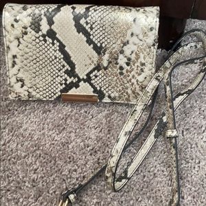 Express snake print shoulder bag or clutch